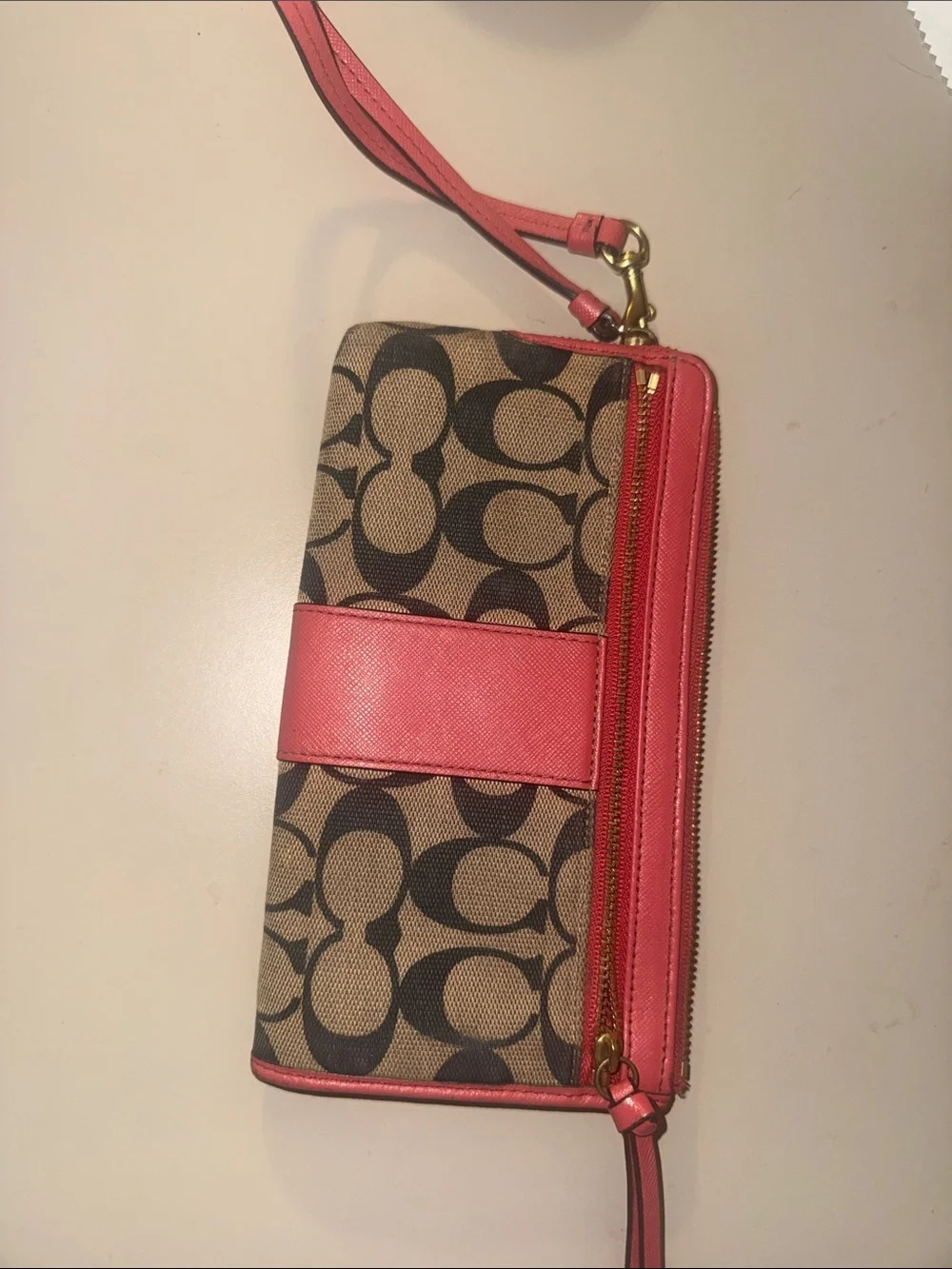 Coach Signature Canvas Wristlet in pink and Tan